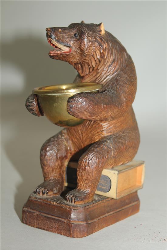 A Black Forest carved bear match tidy, 5.5in.